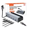 A product shot of a docking station for a Steam Deck console, along with its packaging and accessories. Produktbild-Vorschau