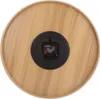 The back of a round wooden clock with a black mechanism in the center. Anteprima dell’immagine prodotto