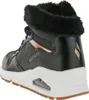 A side view of a black Skechers boot with a white sole and rose gold accents. Náhled obrázku produktu