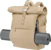 A tan rolltop backpack with a yoga mat strapped to the side. Produktbild-Vorschau