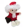 A plush toy dressed as Santa Claus, sitting and holding a small black bag. Produktbild-Vorschau