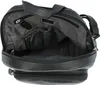 The inside of a black leather backpack is shown. Voir les images du produit