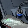 A car's interior with a phone charging from a car charger. Náhľad obrázku produktu