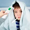 A child is being checked for fever with a thermometer. Produktbild-Vorschau