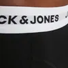A close-up shot of the waistband of black boxer shorts with the 'JACK & JONES' logo printed on it. Produktbild-Vorschau