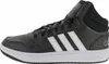 A side view of a black Adidas Hoops 3.0 Mid Classic Vintage sneaker against a white background. Produktbild-Vorschau