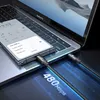 A smartphone and a laptop are connected by USB-C cables, with text indicating data transfer speed. Podgląd zdjęcia produktu