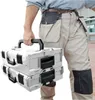 A person is holding two stacked toolboxes. Náhled obrázku produktu