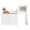 A white vanity table with a mirror and drawers, decorated with cosmetics and flowers. Anteprima dell’immagine prodotto