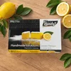 Kandylas Loukoumi Zitrone Packung umgeben von Zitronen Produktbild-Vorschau