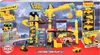 The image shows the packaging of a Dickie Toys construction playset, featuring a large yellow crane and various construction vehicles. Produktbild-Vorschau