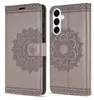 A gray flip case for a Samsung Galaxy A16 phone, with a mandala pattern embossed on the front. Produktbild-Vorschau