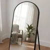 A full-length mirror reflecting a chair with a blanket and a potted plant in a room. Produktbild-Vorschau