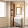 A bathroom scene with a tall wooden cabinet and a gray vanity with a white sink. Produktbild-Vorschau