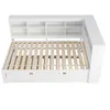 A white sofa bed with storage shelves and drawers, shown from a high angle. Produktbild-Vorschau
