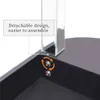Close-up of a furniture assembly detail, showing how a glass panel attaches to a black surface with metal fasteners. Podgląd zdjęcia produktu