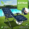 A navy blue reclining chair is set up on a grassy lawn next to a swimming pool. Náhľad obrázku produktu