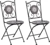 Two black metal folding chairs with ceramic mosaic details on the backrests, set against a white background. Podgląd zdjęcia produktu