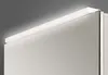 A close-up view of the top edge of a mirrored cabinet with integrated LED lighting. Náhľad obrázku produktu