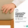 A child's hand is shown resting on a beige mattress, with text and icons indicating product features. Produktbild-Vorschau