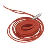 A coiled red heating cable with a silver spring attached to one end, isolated on a white background. Podgląd zdjęcia produktu