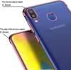 A close-up of a blue phone case with pink trim, showing raised edges for camera and screen protection. Produktbild-Vorschau