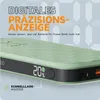A close-up marketing image of a green power bank with a digital display showing 20% battery. Produktbild-Vorschau