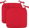 Two red seat cushions are shown from a slightly elevated angle against a white background.