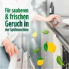 A person is loading a dishwasher with lemons and leaves floating around. Podgląd zdjęcia produktu
