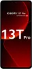 A marketing image of a Xiaomi 13T Pro smartphone with a red gradient background. Podgląd zdjęcia produktu