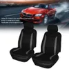 A red car driving on a road with smoke or dust behind it, and two black car seat covers in the foreground. Produktbild-Vorschau