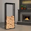 A firewood rack filled with logs next to a fireplace. Produktbild-Vorschau
