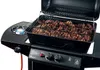 A close-up shot of a gas grill with food on the grate and a side burner. Náhled obrázku produktu