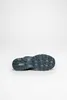 The bottom view of a green shoe on a white background. Voir les images du produit