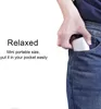 A hand is putting a white product into a blue denim pocket. Produktbild-Vorschau