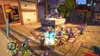 A scene from a video game showing characters in a town square with a statue and posters. Produktbild-Vorschau