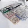 A collection of several iPhone cases with diamond embellishments arranged on a white surface. Produktbild-Vorschau