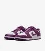 A pair of Nike Dunk Low Retro "White Viotech" sneakers are shown against a white background. Produktbild-Vorschau