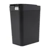 A black automatic trash can is shown against a white background. Náhled obrázku produktu