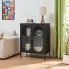 A black cabinet with fluted glass doors is displayed in a living room setting. Podgląd zdjęcia produktu