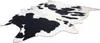 A cowhide rug with black and white patches is displayed on a white background. Produktbild-Vorschau