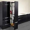 A modern black kitchen cabinet with a pull-out pantry organizer filled with kitchen items. Produktbild-Vorschau