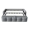 A grey sofa bed with the mattress support extended. Produktbild-Vorschau