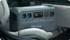 A portable power station is placed on the seat of a car, with cables connected to it. Náhled obrázku produktu