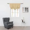 A room setting with a window, a chair, and a small table. Voir les images du produit