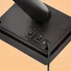 A close-up view of the base of a black lamp, showing two switches and a power cord. Produktbild-Vorschau