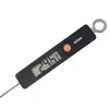 A digital thermometer with a metal probe is shown against a white background. The thermometer has a black body with an orange button and a digital display showing a temperature reading. Produktbild-Vorschau