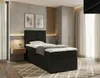 A bedroom scene featuring a black boxspring bed with a white mattress and bedding, a bedside table with a lamp and plant, and artwork on the wall. Náhľad obrázku produktu