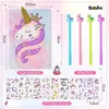 Cahier en peluche avec motif licorne et accessoires Voir les images du produit 2
