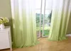 A room with curtains and a window overlooking a garden. Produktbild-Vorschau
